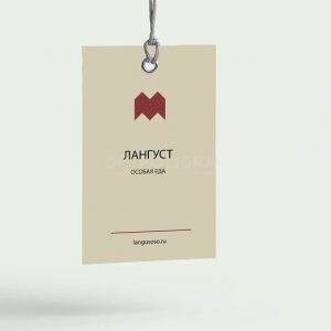 Бирка с металлическим кольцом, укрепляющим отверстие